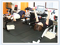 写真：上肢加圧トレーニング